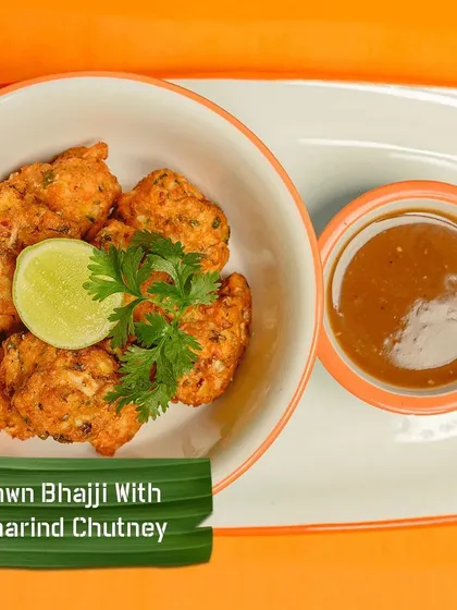 Prawn Bhajji with a tangy tamarind chutney. These crispy, savoury fritters are a perfect starter and a unique take on a classic snack.