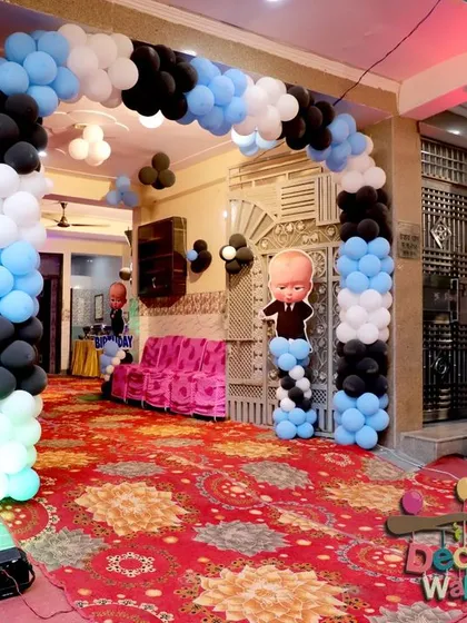 Even a party at home can have a grand entrance. For Manvit's first birthday, I created this Boss Baby themed welcome arch right at the front door, complete with character cutouts and a personalized banner. It sets a fun and exciting mood from the moment guests arrive.