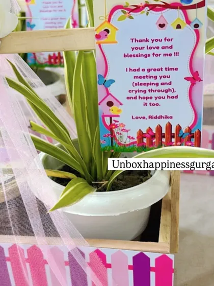 This close-up highlights the sweet, personalized thank you note that accompanies each plant-based favor.