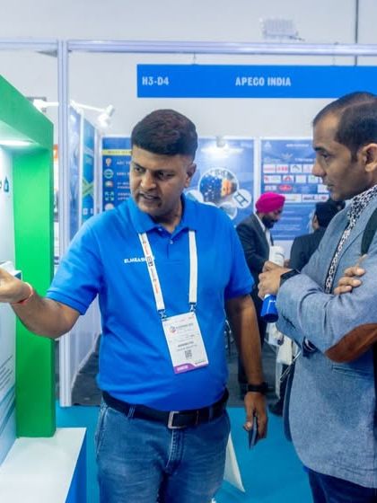 My team member explaining my protection and control devices to an interested visitor at ELECRAMA.