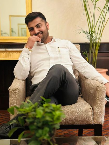 A relaxed moment in a formal setting. Confidence comes from being prepared.