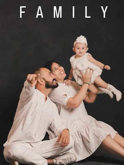 A modern and artistic take on the family portrait. The simple "FAMILY" text overlay adds a stylish touch to this beautiful image.