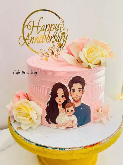 Because every love story deserves a beautiful chapter. A sweet anniversary cake with a family portrait and fresh flowers.