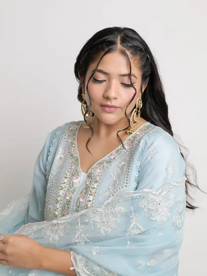 A close-up of Sakshi Gopal's 'Heeramandi' inspired look. The winged eyeliner is soft, and the skin has a luminous finish, creating a dreamy and romantic feel.