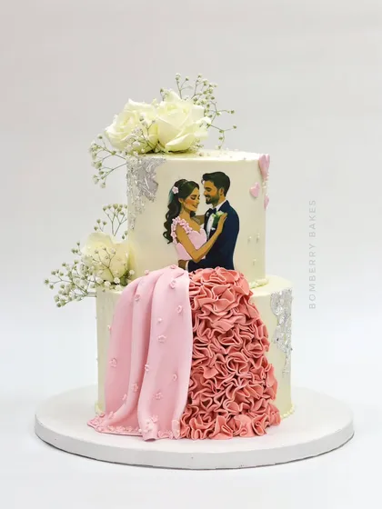 A personalized two-tier wedding cake featuring a custom illustration of the couple, with a flowing, ruffled fondant dress.