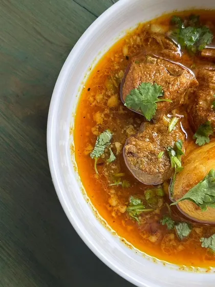 This is my comforting Mutton Curry, slow-cooked until the meat is tender and falling off the bone. The rich, aromatic gravy with soft potatoes is perfect with steaming hot rice, a dish that brings back memories of Sunday lunches at home.