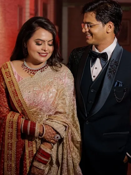 A lovely photo of the bride and groom. Her reception makeup is glamorous yet timeless, ensuring she looks and feels her best next to her partner.