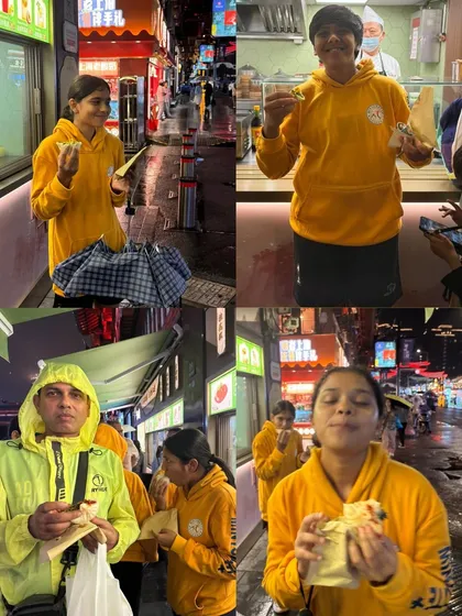 Trying out the local street food in Shanghai. A delicious and fun part of the cultural experience.