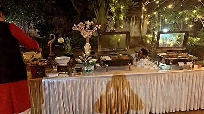 An evening house party in Sainik Farms with a beautiful garden setup. The twinkling lights and our delicious food created a warm and festive atmosphere for this gathering of 45 guests.