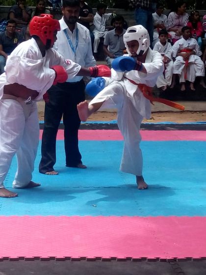 A dynamic exchange during a youth tournament. These events build confidence and fighting spirit.