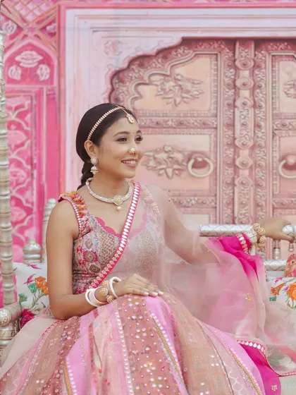 A beautiful candid of Yogini enjoying the event. Her makeup is subtle enough to let her natural smile be the focus.