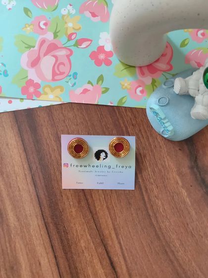 My zardozi studs are perfect for everyday wear or for the office. They feature intricate thread work and are available in a wide range of colors to match any outfit.