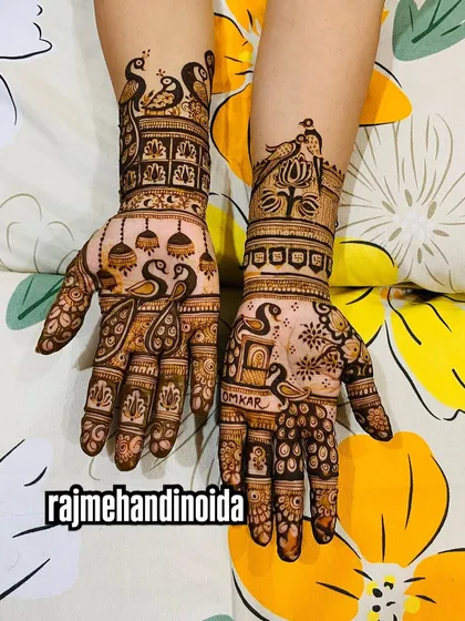 This festive design is filled with graceful peacocks and hanging jhumkas. It's a beautiful choice for celebrations like Raksha Bandhan or a family wedding.