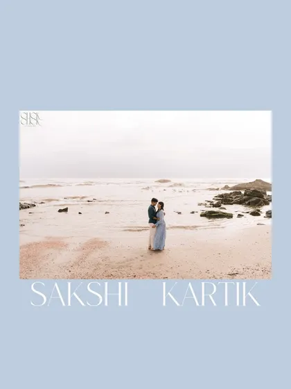 Sakshi and Kartik standing together on a quiet Goa beach, a serene and timeless portrait against the vastness of the sea.