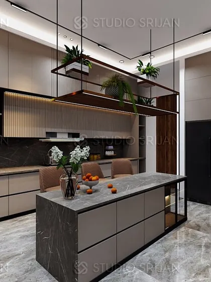 Another view of the Alameda kitchen, showcasing the extensive storage, including full-height pantry units and a dedicated station for built-in appliances like the oven and microwave.