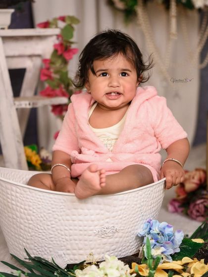 A collection of our fun and bubbly bathtub photos. This theme allows for playful and candid shots, with props like rubber ducks and cozy robes to complete the look.