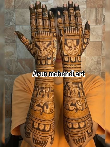 A full-arm design with repeating bands of traditional motifs, creating a rich and textured look.