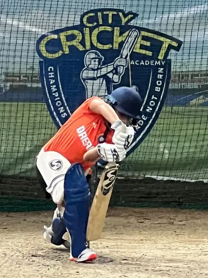 Before playing for the country, the hard work happens here. This is Tanuja Kanwar during a focused batting session at our academy, perfecting her technique against the backdrop of our motto: "Champions are made not born."