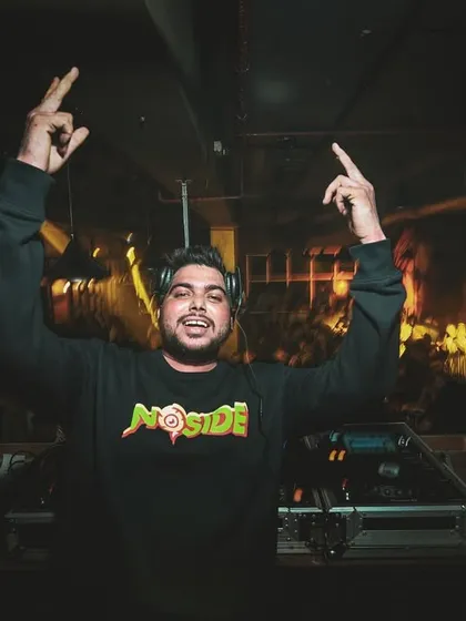 Hands up, believing in the power of music to bring people together.