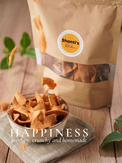 Happiness is crispy, crunchy, and homemade. Here, my Ribbon Murukku is captured in motion, showing just how light and crisp each piece is.