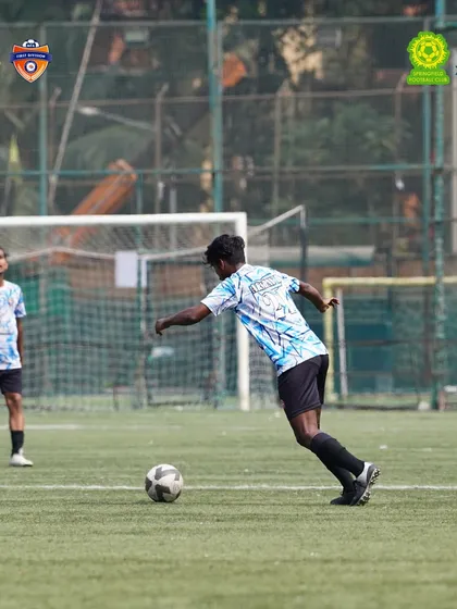 A player controls the ball during our 3-0 win, a match defined by our team's solid performance from start to finish.