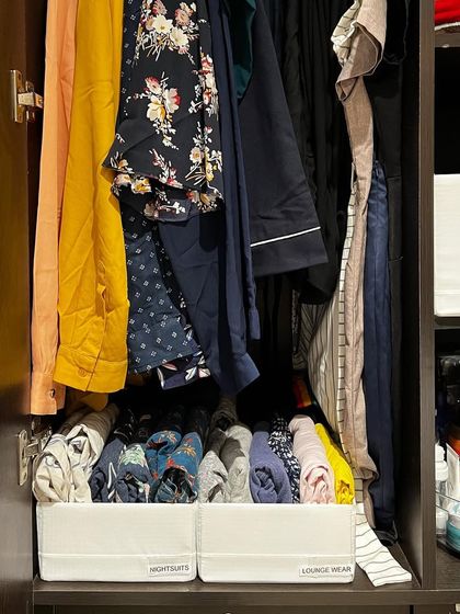 Labeled bins for "Nightsuits" and "Lounge Wear" create a clear and simple system. This level of detail is what makes our organizing solutions so easy to maintain long-term.