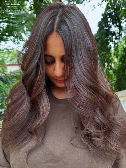 A classic 'Chestnut Brown'. This is a timeless and elegant color that suits so many skin tones. It’s rich, warm, and full of shine.