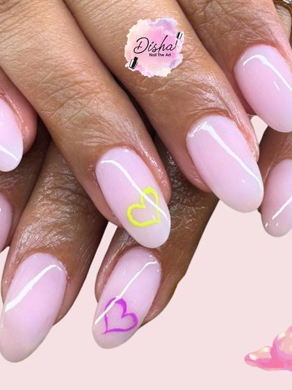 The prettiest shade of pink. A simple and clean design with a sheer pink base, white swirls, and tiny heart details.