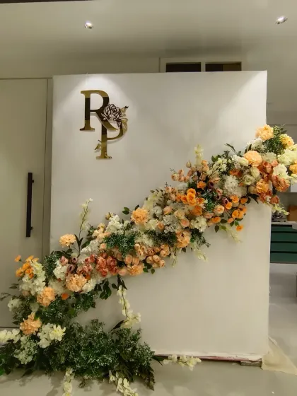 Another angle of the diagonal floral backdrop, showing how the arrangement beautifully cascades down the panel.