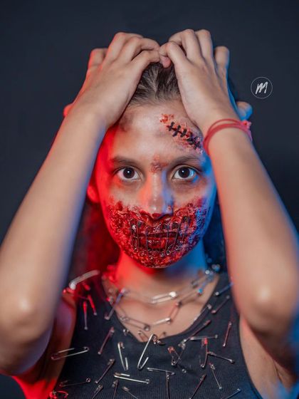 A look from my SFX demo class. Here we created a stitched wound and a gruesome mouth effect using special effects products.