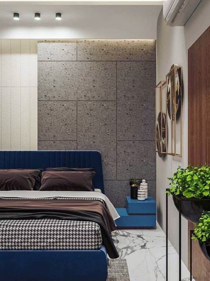 This headboard design uses two different elements at different levels to create a wow factor. The combination of a textured panel and a cushioned headboard adds depth and visual interest to the bedroom.