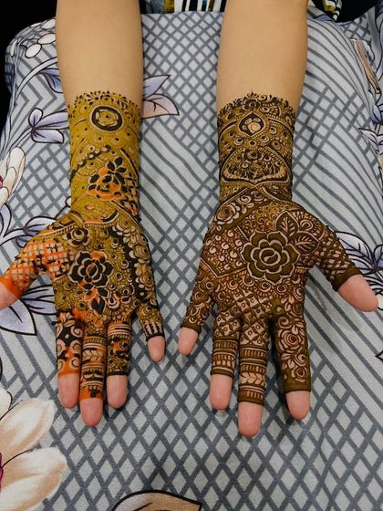 The full view of this non-bridal design. The patterns on each hand are slightly different, creating a unique and personalized look.