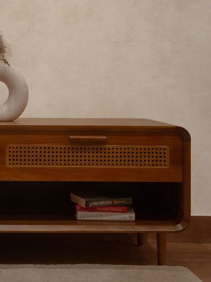 A straight-on view of the 'Lobo' cabinet, highlighting its clean, rounded edges and mid-century modern inspired legs.