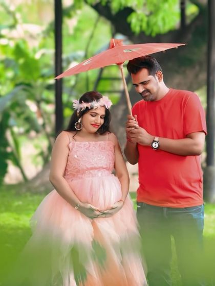 This unique asymmetric gown features layers of peach and red net, creating a beautiful ombre effect. It's a playful and colorful option for an outdoor shoot.