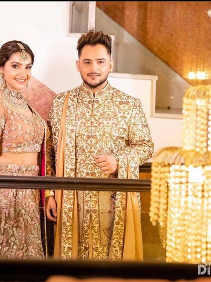 A beautiful shot of Pallavi Gaba on her engagement, wearing our elegant polki choker set that perfectly complements her pastel lehenga.