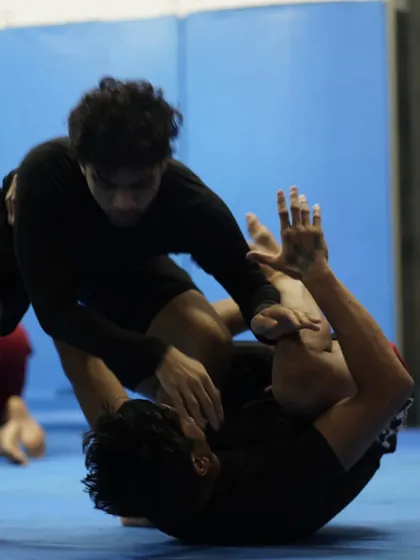 A dynamic grappling scramble. These moments are crucial for developing instincts and the ability to transition between positions quickly.