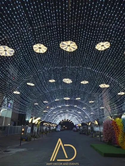 For a grand Diwali celebration, I designed and installed this massive tunnel of lights, creating an immersive and dazzling experience for an entire street.