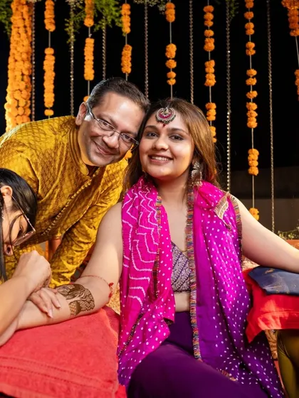 A lovely moment with the bride and her father as I apply her mehendi. It's a family affair!