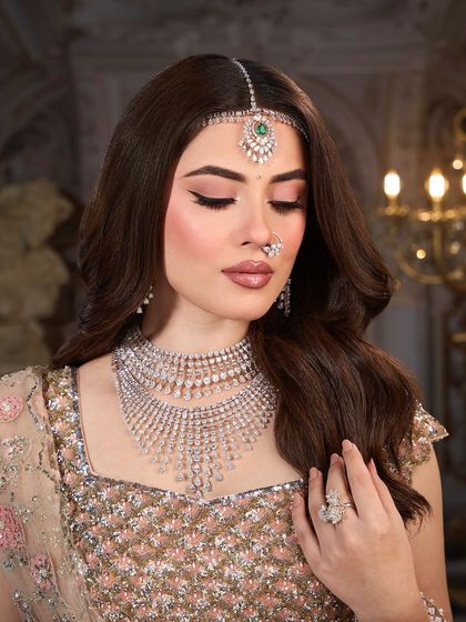 Embracing elegance with a soft and timeless bridal look. This makeup features gentle pink tones and a subtle glow, perfect for the modern romantic bride.
