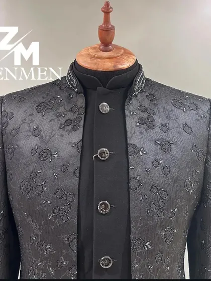 A close-up of the black tonal embroidered Indo-Western, showing the intricate floral pattern and the high-quality buttons.
