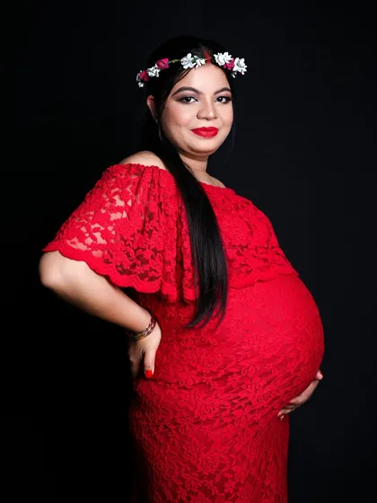 A radiant close up portrait of the mom to be. I love using simple props like a floral crown to add a soft, beautiful touch to maternity photos.