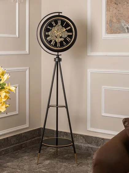 I love pieces that are both functional and artistic, like this standing tripod clock. The exposed moving gear mechanism is a fascinating detail, while the black and gold finish gives it a sophisticated, industrial-luxe feel. It's more than a clock; it's a mechanical sculpture for your room.