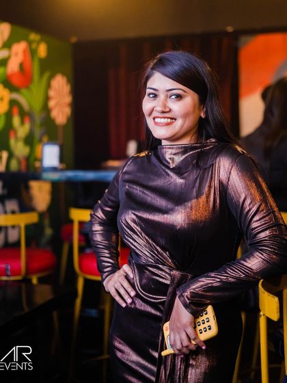 A guest posing at the bar.