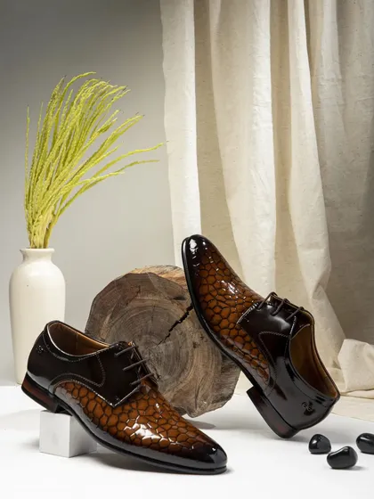 This styled product shot of men's formal shoes highlights my skill in creating sophisticated flat lays for footwear brands. I combine textures like wood and fabric with balanced lighting to emphasize the product's quality and craftsmanship.