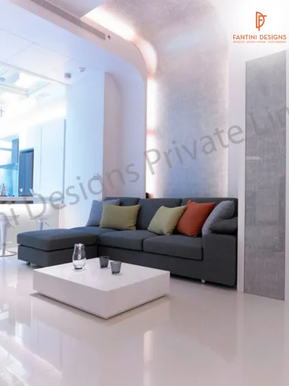 We used a simple color palette with a comfortable grey sectional sofa and a clean-lined coffee table to create a relaxing and modern living space.