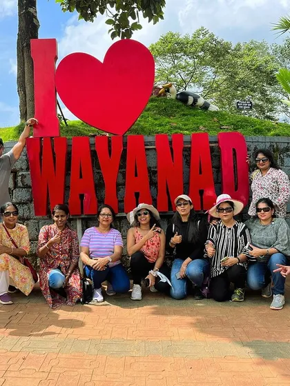 The "I Love Wayanad" sign says it all. Our group posing for a picture after a day of exploring the stunning landscapes and viewpoints of this gem in Kerala.