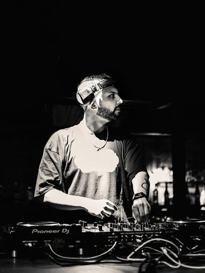 Huh? Dry Day? No gigs? Ok peace out. A black and white shot capturing a moment of reflection between the madness of the parties.