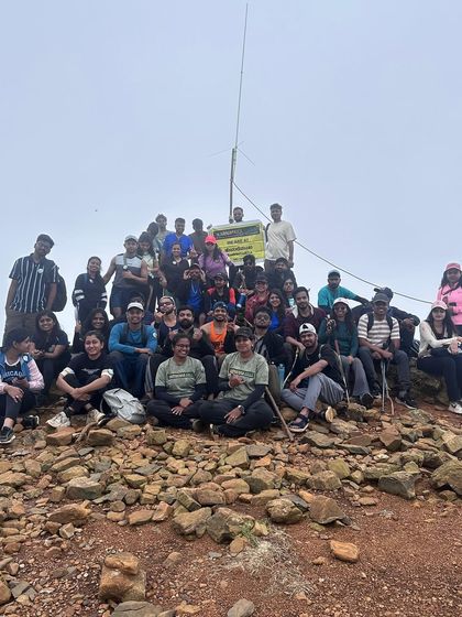 The feeling of accomplishment. Our group photo at the Kudremukha summit, celebrating a successful climb.