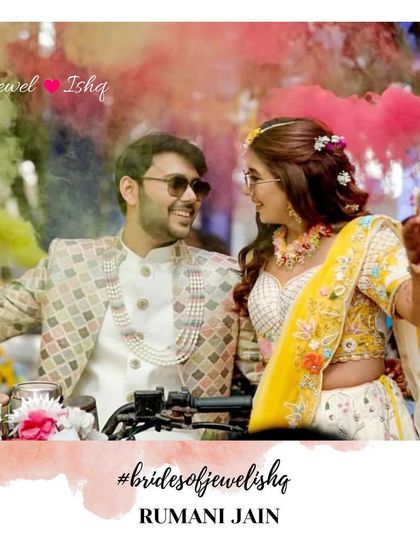 A fun and colorful shot of the couple on a bike with color bombs, capturing the festive spirit of a Haldi ceremony.