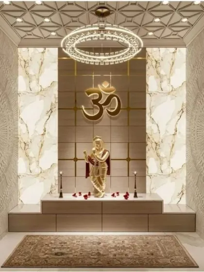 This pooja room design exudes modern luxury with a prominent gold Om symbol against a marble-veined backdrop. The walls feature intricate 3D textured patterns, and a contemporary ring chandelier provides brilliant illumination for the entire space.